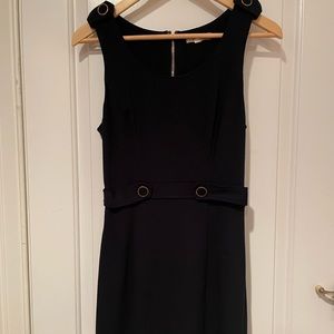 Navy blue form fitting button dress by Alythea
